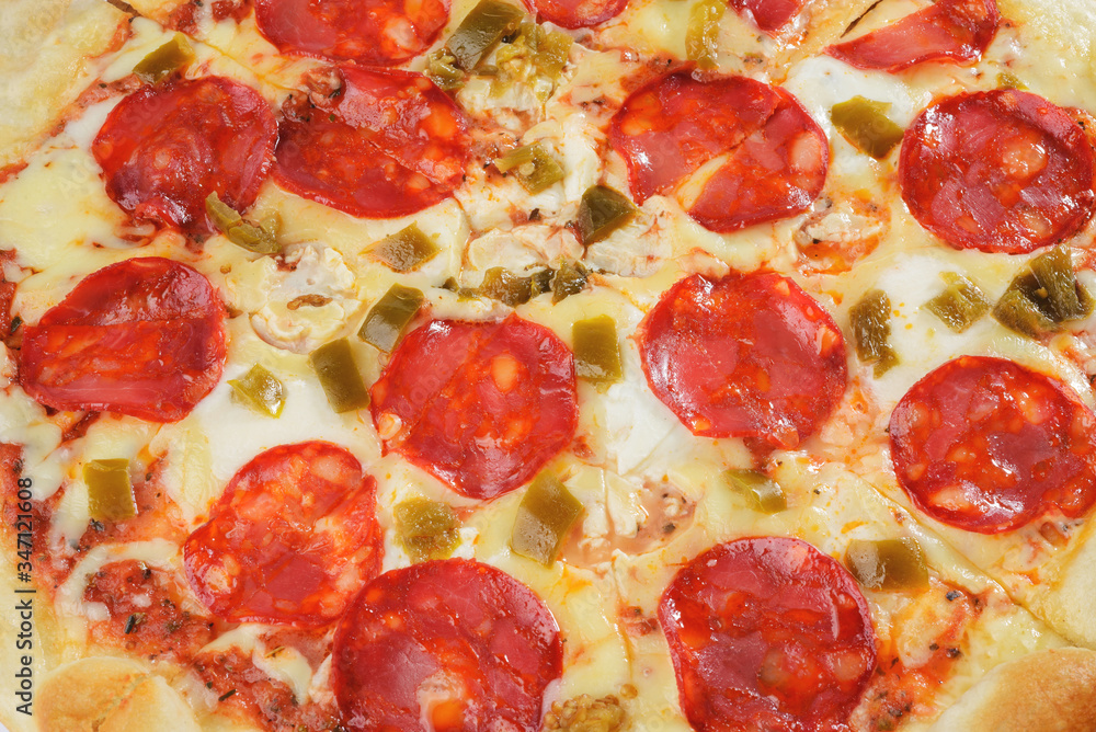 Classic italian pizza with pepperoni and cheese close-up Classic italian pizza with pepperoni and cheese close-up