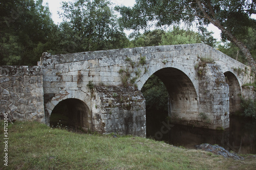 Puente romano sobre el rio Tuela en Sanabria (zamora) photo