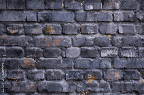 Old wall of stone bricks as a texture or background