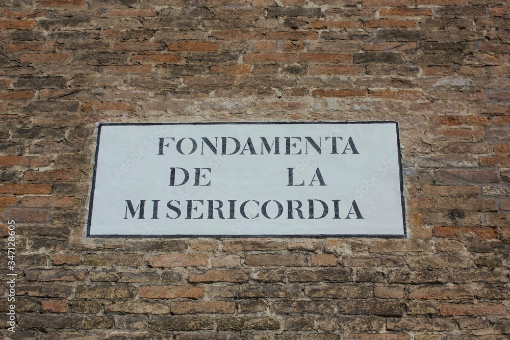 Fototapeta premium Road sign of Fondamenta de la Misericordia in Venice