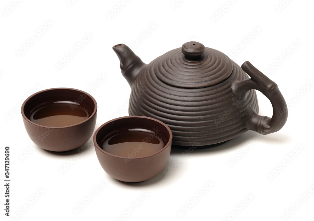 Closeup of tea set on white background