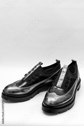 pair of black leather shoes 