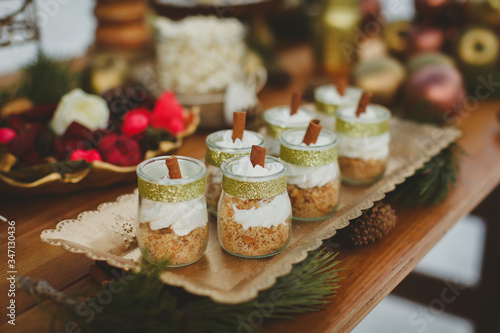 Wedding candy table. Wedding winter cake in the snow. Close up.