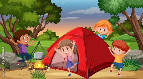 Scene with happy kids camping in the woods