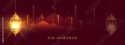 beautiful eid mubarak banner with shiny islamic lantern