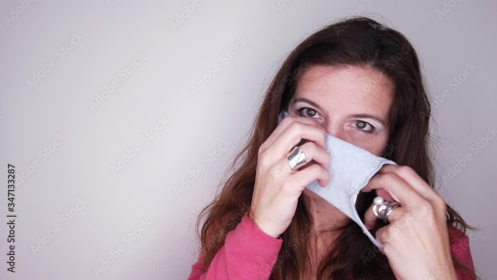 Woman in fabric mask during quarantine time of COVID 9 Woman in fabric mask during quarantine time of COVID 9