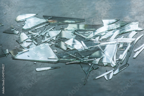 Broken glass many pieces on the floor