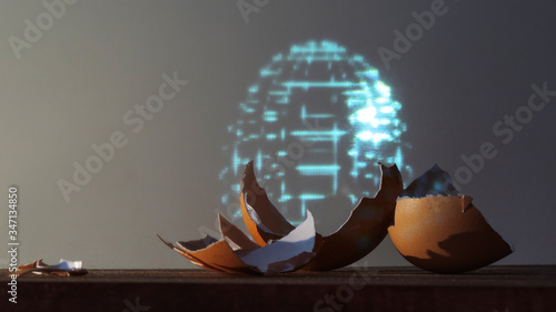 An eggshell and a hologram of an entire egg. The cyberpunk concept.