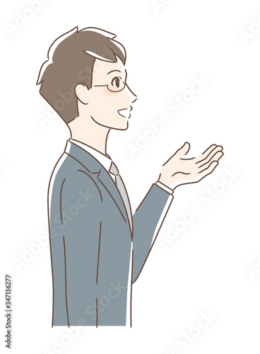 笑顔で手を差し出す男性の横顔