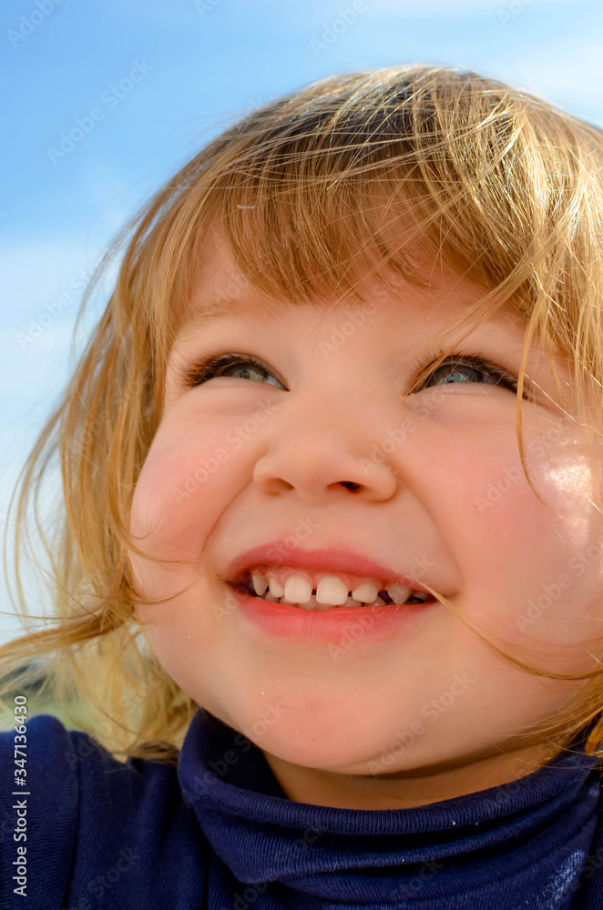 cute happy little girl playing on the beach cute happy little girl playing on the beach