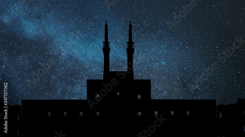 Mosque Amir Chakhmaq, Time Lapse by Night with Stars, Milky Way and Silhouette of Complex, Yazd, Iran photo