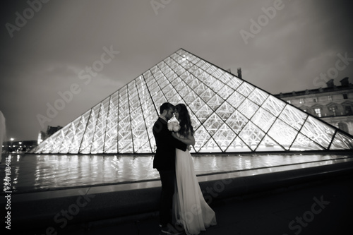 Happy bride and groom enjoying their wedding in Paris