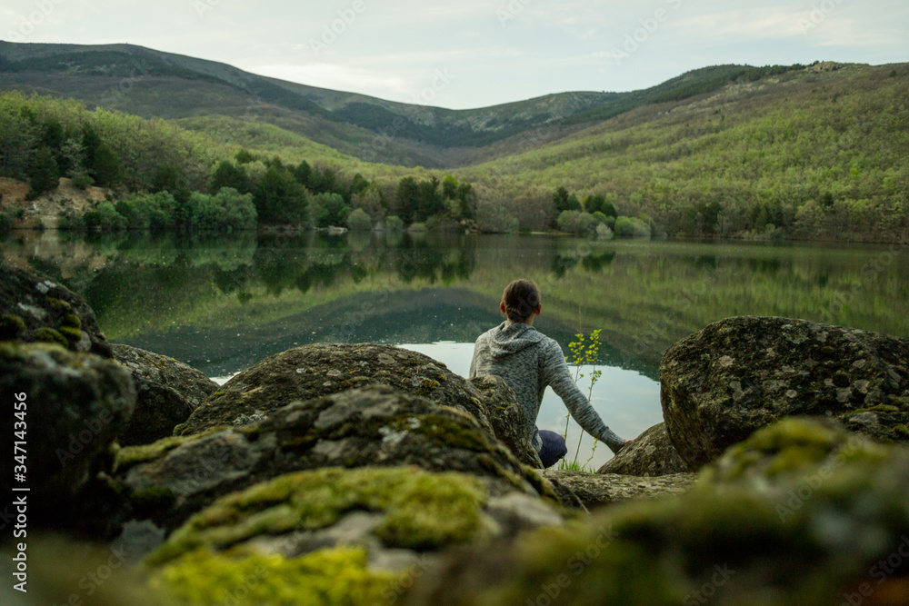 a man alone at a lake