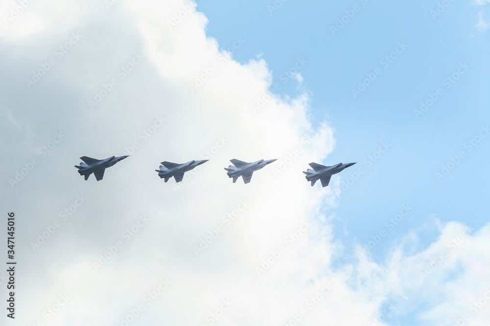 A group of warplanes flying at the blue sky
