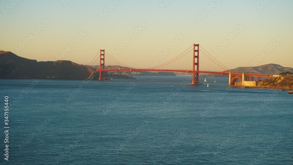 Golden Gate Bridge captured from Lands end during sunset hour. Golden Gate Bridge captured from Lands end during sunset hour.