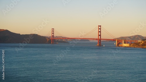 Fototapeta Naklejka Na Ścianę i Meble -  Golden Gate Bridge captured from Lands end during sunset hour.