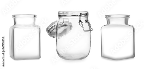 Set with open empty glass jars on white background