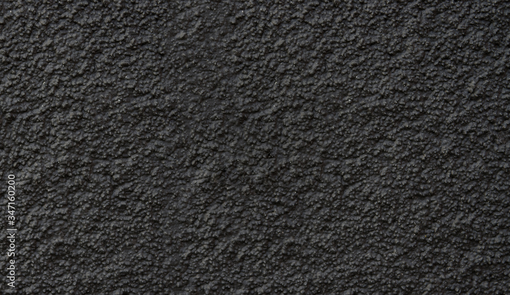 New asphalt close-up. Black background or texture. New asphalt close-up. Black background or texture.