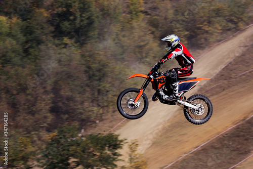 The motorcyclist in flight. Motocross. Sports. In the background draw.