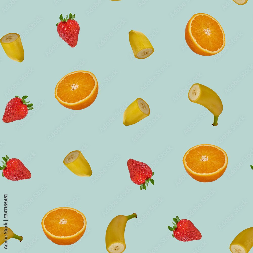 Fruit pattern with smooth blue background, contains strawberries, oranges and bananas.