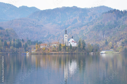 Lake Bled’s famous island with a church rests in the middle of the lake. Assumption of Mary Pilgrimage Church in the middle of Lake Bled.