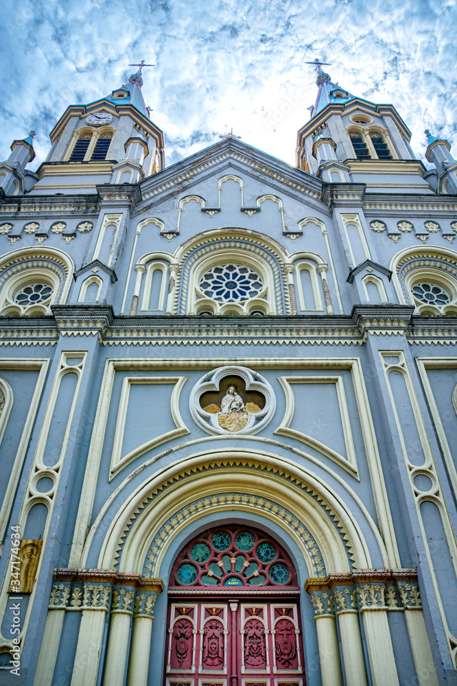 View of the facade of the San Alfonso church in Cuenca, Ecuador. Constructed in the late 1800s, the church is located about a block from the city's central square Calderon Park.