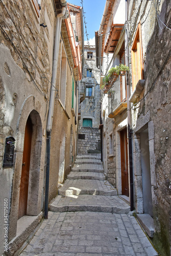 A narrow street between old buildings in the medieval town of Cusano Mutri  in the province of Avellino