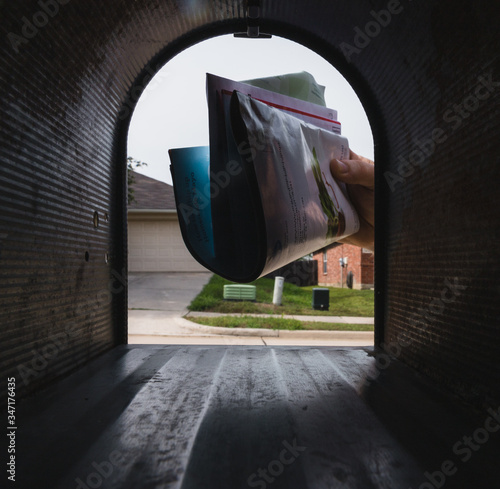 Mailman Delivering Mail