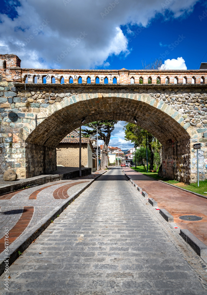 One of the arches of the Puente Roto or Broken Bridge in Cuenca, destroyed by a flood and partially restored as a tourist site, Cuenca, Ecuador, South America.
