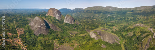 Aerial drone photography of a tropical landscape, with forest and mountains Kumbira forest reserve , huge geologic rock elements photo