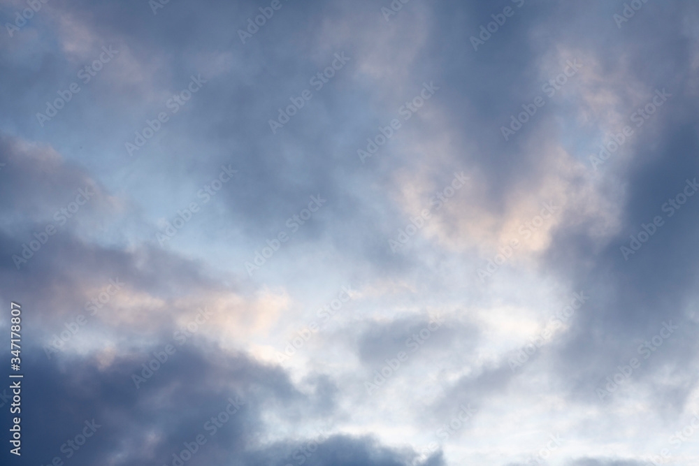 A beautiful sunset sky. Background and texture of thick clouds