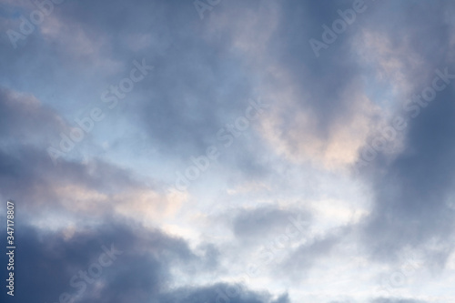 A beautiful sunset sky. Background and texture of thick clouds