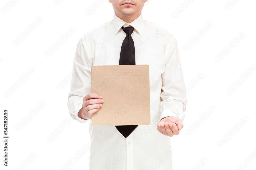 businessman in shirt with a tie holds a cardboard poster protesting unemployment due to quarantine with outstretched hand, concept on the theme of unemployment crisis, isolated on a white background.