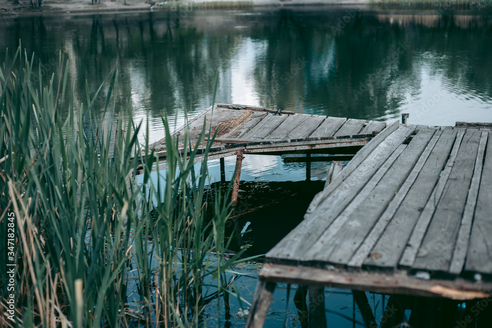 Old wooden pier near the lake