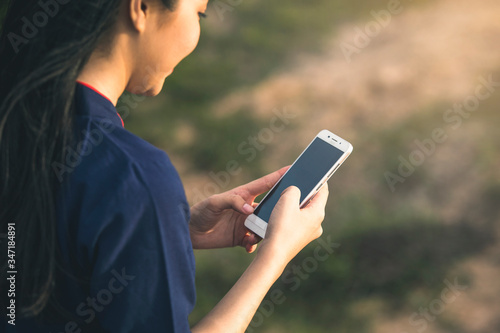 Woman hand using a smartphone