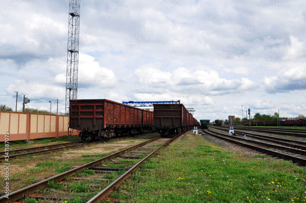 Fototapeta premium Railway cars at the final stop. Rail freight transport.