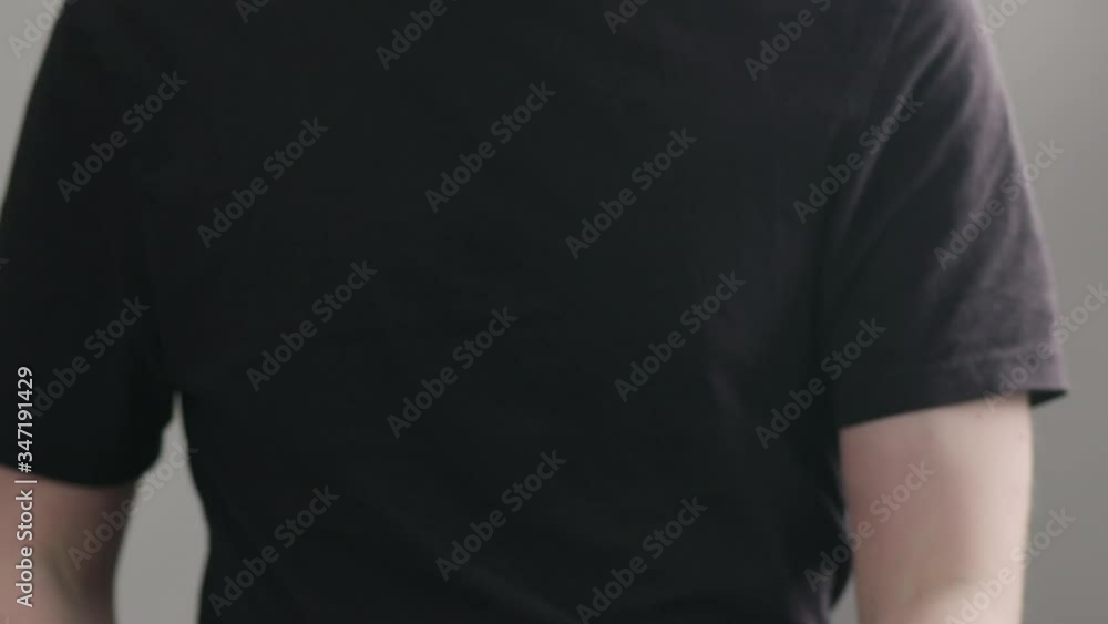 Slow motion man spraying sanitizer on his hands front shot Slow motion man spraying sanitizer on his hands front shot