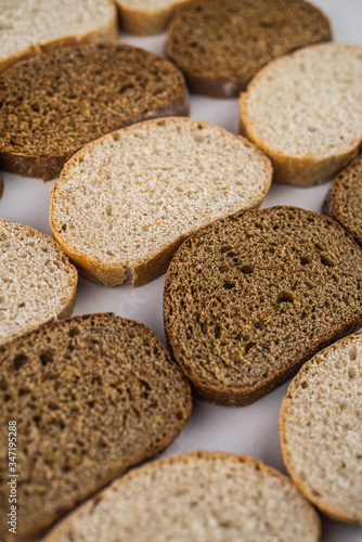 Assortment of baked bread, Sliced bread, Fresh loaves of bread, Different kinds of fresh bread