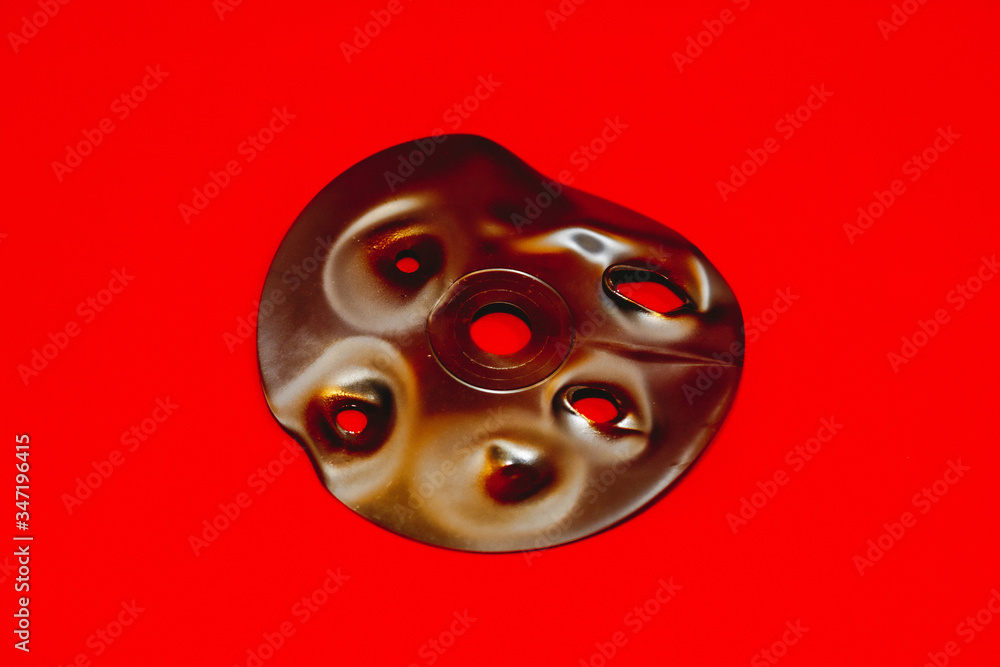 Scratched and damaged billet for a laser music disc Scratched and damaged billet for a laser music disc