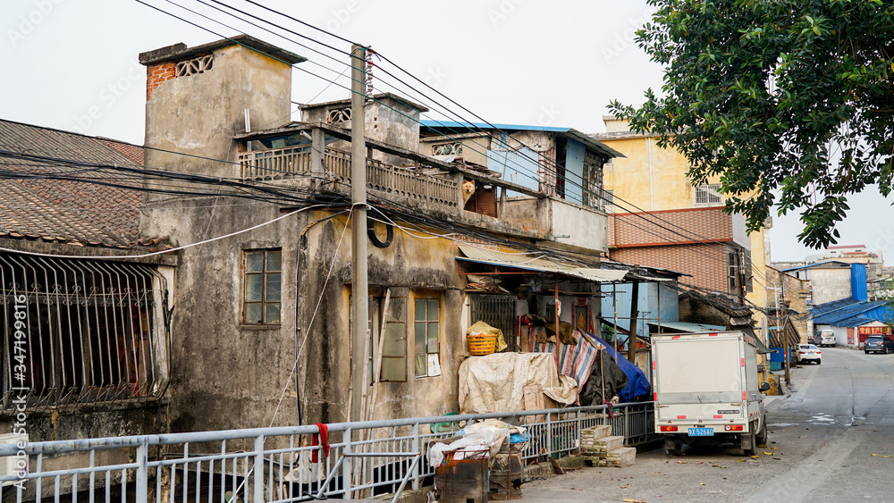 Shunde, Foshan, China - April 3, 2017: old house in the small old town city in China, Asia, colonial architecture, British architecture, rich Easter Chinese culture, public streets, poverty in Asia
Shunde, Foshan, China - April 3, 2017: old house in the small old town city in China, Asia, colonial architecture, British architecture, rich Easter Chinese culture, public streets, poverty in Asia