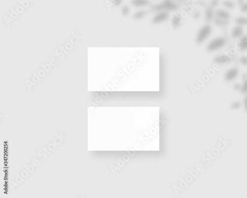 Blank white business cards mockups with shadow Overlays. Mockup scene. Photo mockup with clipping path.