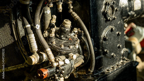 Φωτογραφία Old Soviet aircraft engine. Gears and carburetor