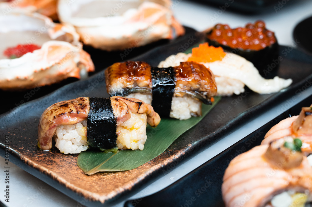 Foie gras, unagi, engawa and salmon roe sushi Foie gras, unagi, engawa and salmon roe sushi