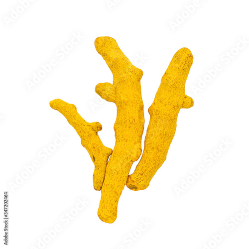 Dry turmeric roots isolated on white background.