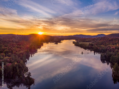 Fototapeta Naklejka Na Ścianę i Meble -  Lake Durant  autumn sunset in the High Peaks Wilderness area of New York Adirondack