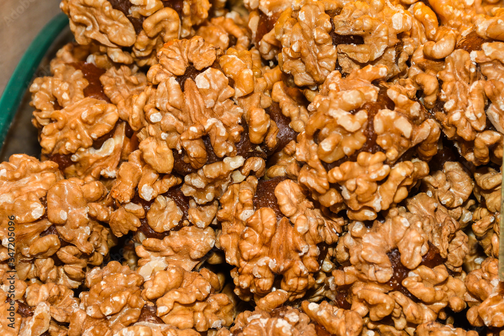 Turkish fruit and nut candy. Scattered pistachio and almond nuts. Turkish fruit and nut candy. Scattered pistachio and almond nuts.