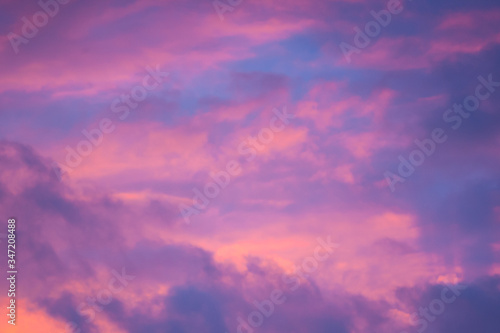 Unfocused pink and blue cloudy sky