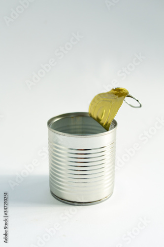 the open tin can on a white background