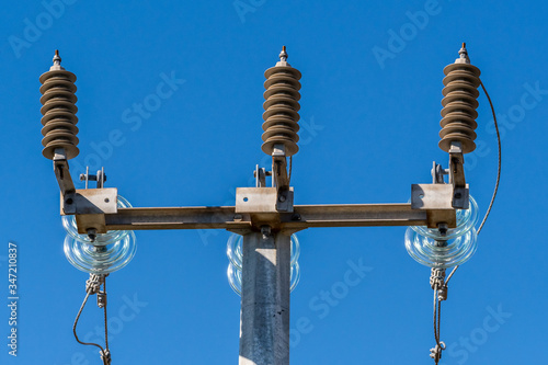 Insulators on top of a electricity pylon