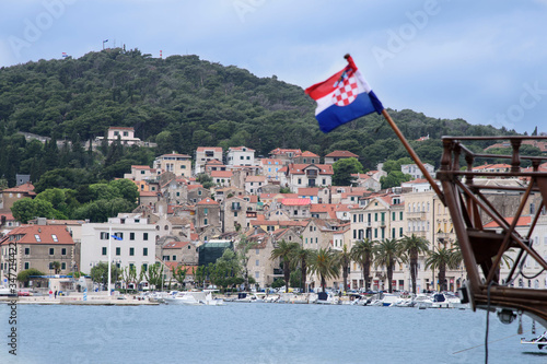 Flag, port and mount Split, port city of the Dalmatian coast, on the Adriatic Sea, Croatia, Europe. photo